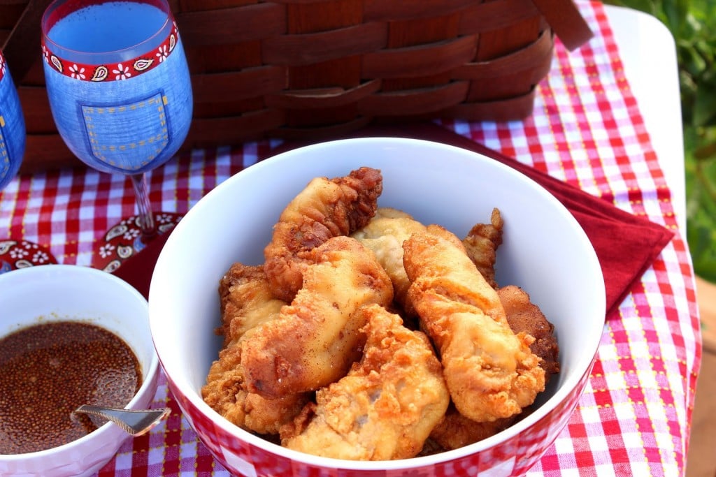 All the flavors you love from a traditional chicken and waffles recipe, but in an easily transportable package. Waffle Batter Fried Chicken Tenders with Maple Mustard Dipping Sauce is perfect for parties or picnics. - kudoskitchenbyrenee.com Waffle Batter Fried Chicken with Maple Mustard Dipping Sauce - kudoskitchenbyrenee.com