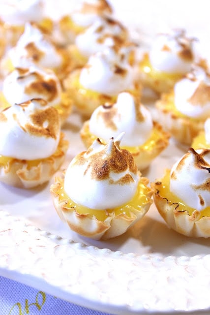 Perfectly Sweet Lemon Meringue Tartlets are the perfect treat when you want just a little something sweet...and a little something sour. - Kudos Kitchen by Renee Lemon Meringue Tartlets