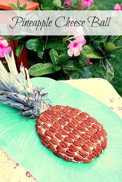This Super Cute Luau Pineapple Cheese Ball will be the hit of your next party. It's really easy to make, and is crazy delicious too. - Kudos Kitchen by Renee Pineapple Cheese Ball