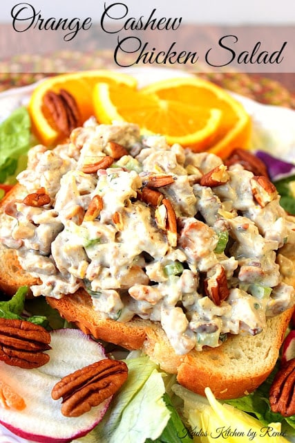 Orange Cashew Chicken Salad uses poached chicken thighs, roasted cashews and pecans, along with a touch of orange zest and juice. It's simply the best chicken salad, ever! - Kudos Kitchen by Renee Orange Cashew Chicken Salad - www.kudoskitchenbyrenee.com