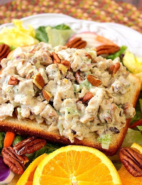Orange Cashew Chicken Salad uses poached chicken thighs, roasted cashews and pecans, along with a touch of orange zest and juice. It's simply the best chicken salad, ever! - Kudos Kitchen by Renee Orange Cashew Chicken Salad - www.kudoskitchenbyrenee.com