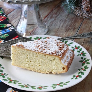 A slice of an Anise Cookie Bar on a holiday plate.