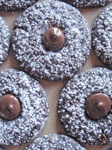 An overhead closeup of Chocolate Mint Mousse Cookies with a dollop of chocolate in the middle.