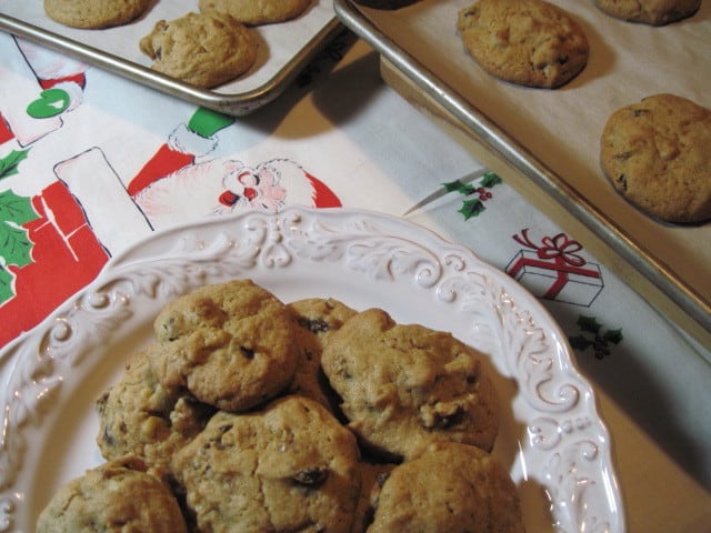 Retro feel photo of a plate of vintage rocks cookies on a Christmas tablecloth.