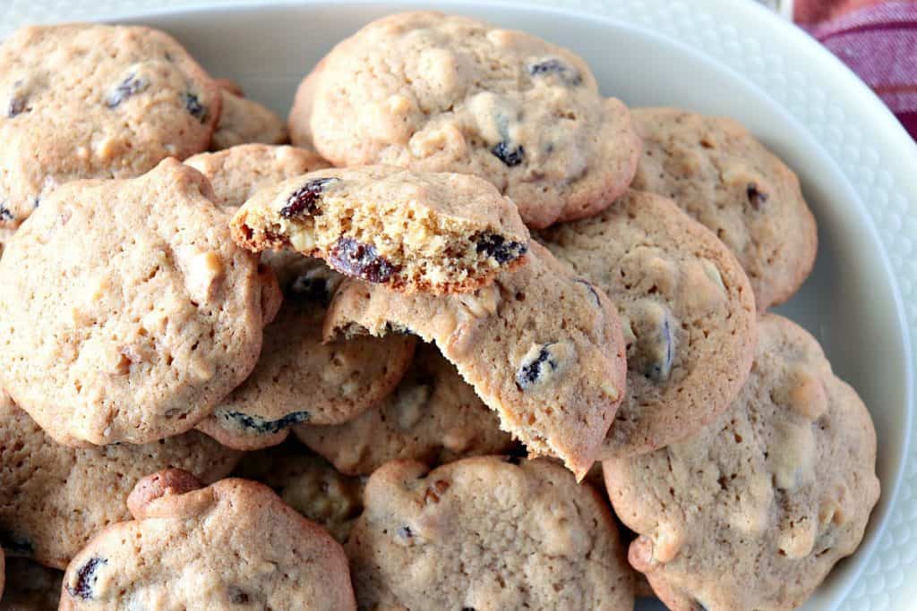 Overhead photo of a broken rocks cookie with raisins and walnuts.