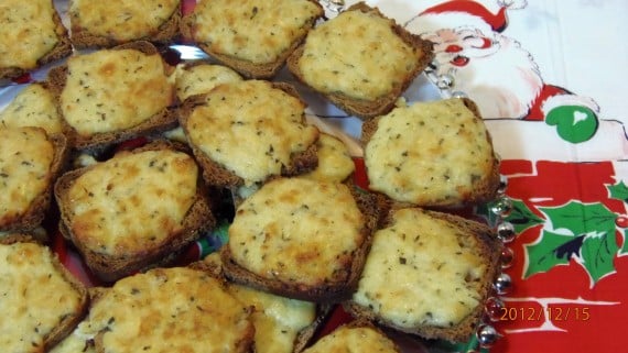 Parmesan Onion Appetizer Squares with Santa Claus table cloth from 2012 
