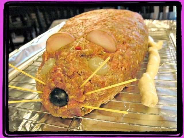 Filled with cheesy "guts", this Creepy Halloween Rat Loaf Meatloaf will gross out everyone at the dinner table. In a good way, of course. - Kudos Kitchen by Renee Halloween Meatloaf Recipe