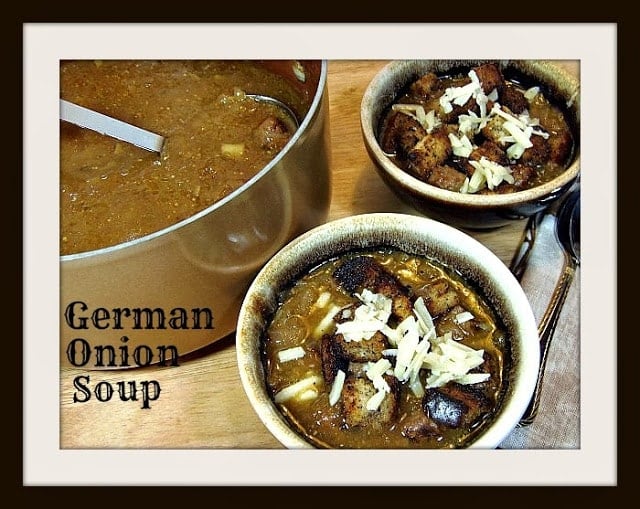 A pot of German onion soup with two smaller brown bowls.