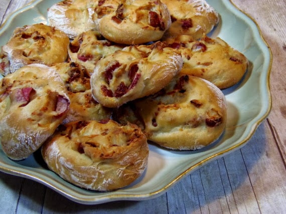 A serving platter stacked high with Roasted Radish Rolls.