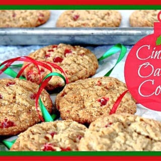 A horizontal photo of a bunch of Cinnamon Oatmeal Cookies along with red and green ribbon.