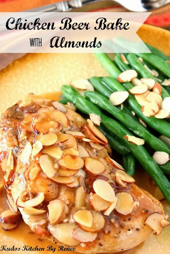 Closeup Title text vertical image of chicken beer bake with almonds along with green beans on a golden colored plate.