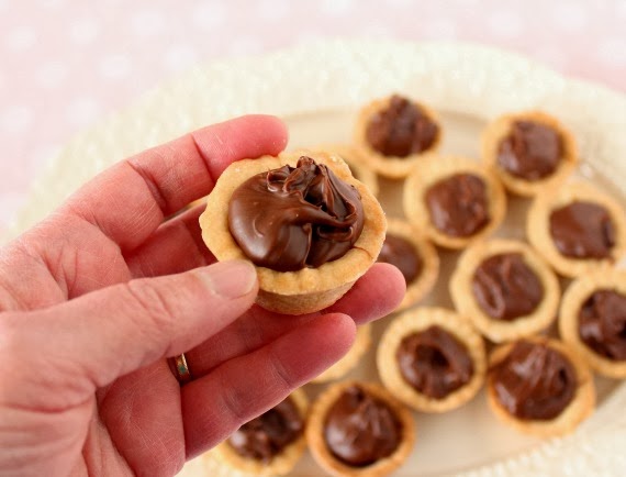 If these Nutella Cookie Cups don't make your mouth water just a little, then your eyes must be closed! LOL - Kudos Kitchen by Renee - www.kudoskitchenbyrenee.com Nutella Cookie Cup Recipe
