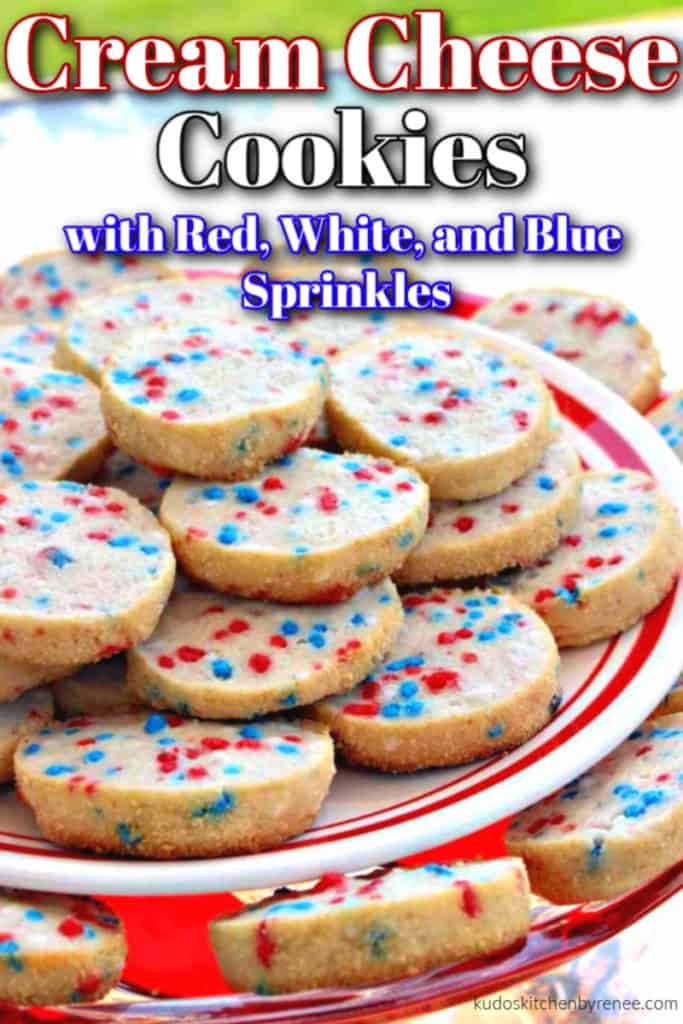 Closeup vertical image of cream cheese cookies with red, white, and blue sprinkles on a tiered cookie plate.