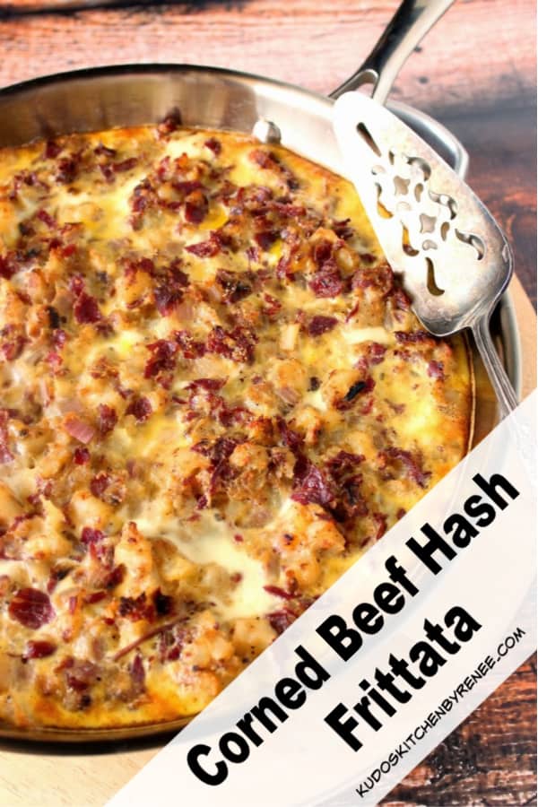 A vertical closeup photo of a corned beef hash frittata in a skillet for a popular St. Patrick's day recipes roundup post.