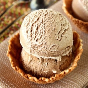 Two scoops of Root Beer Ice Cream and in waffle cone bowl.