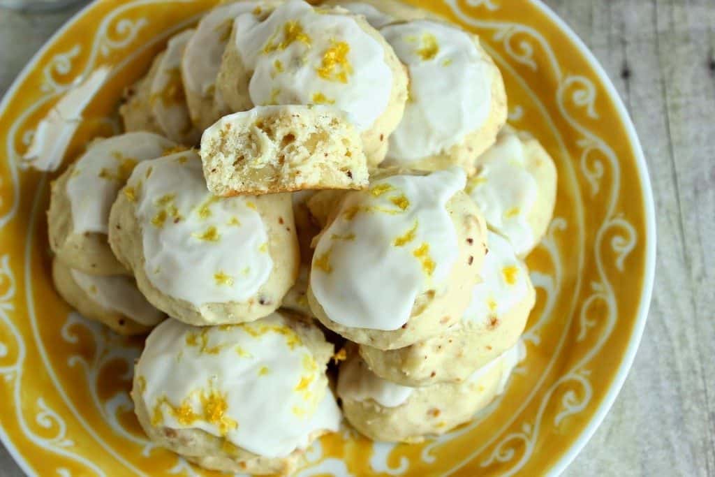 Overhead photo of a plate of  Lemon Ricotta Cookies with Almonds  