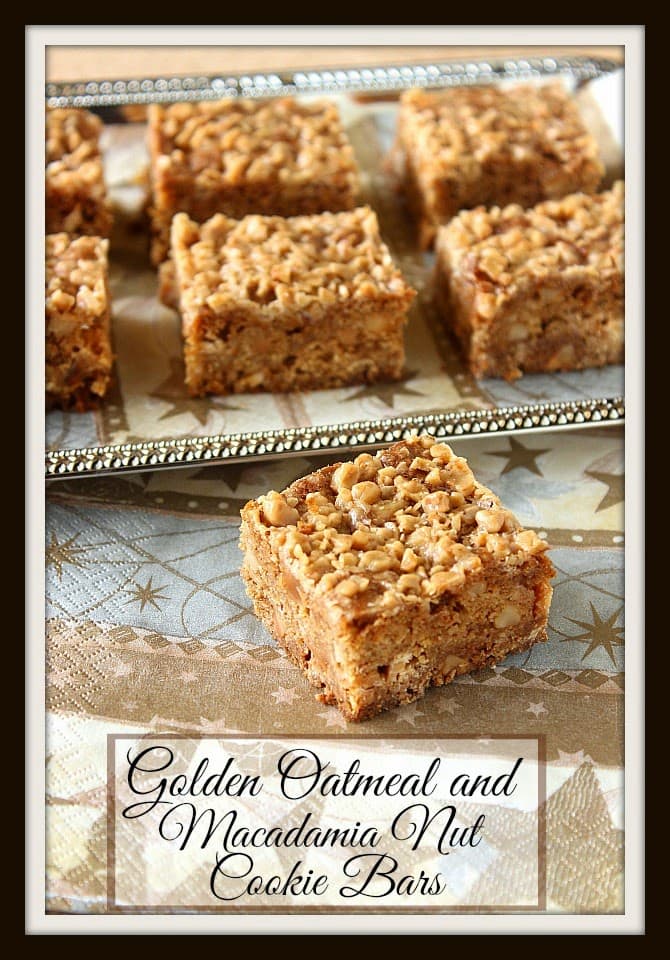 Golden Oatmeal and Macadamia Nut Cookie Bars on a silver platter.