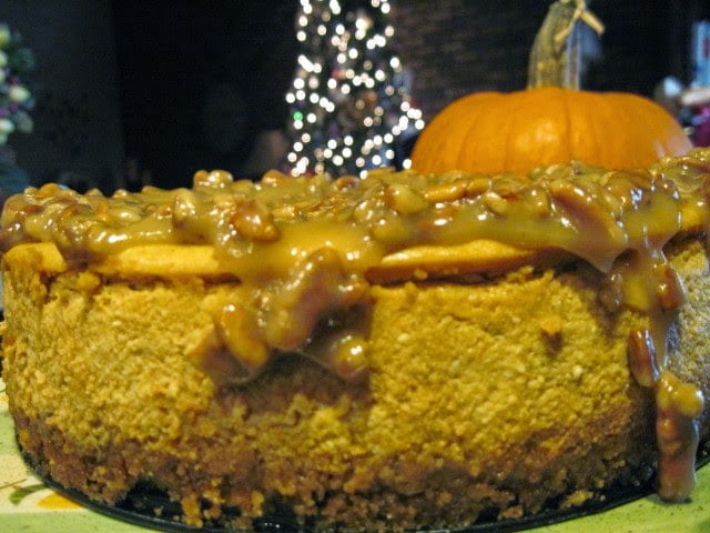 Maple Pumpkin Cheesecake with pecan caramel sauce