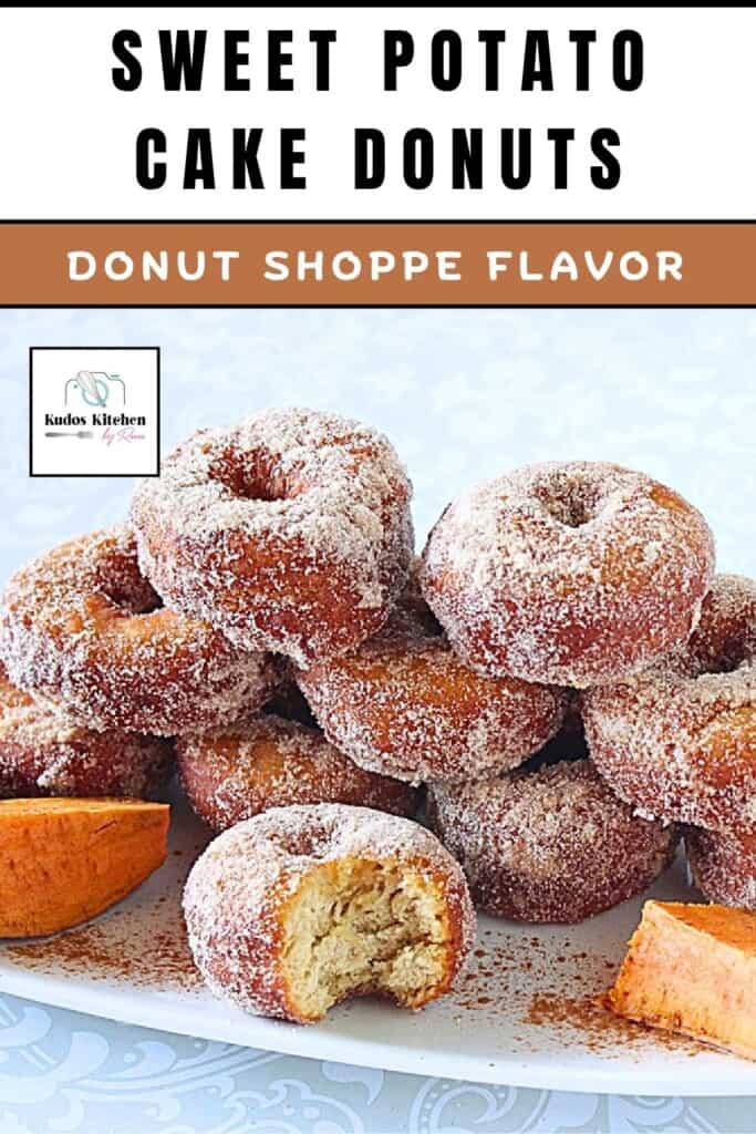 A stack of cinnamon sugar coated sweet potato cake donuts on a plate.