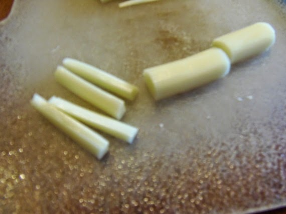 String cheese cut into bone pieces.