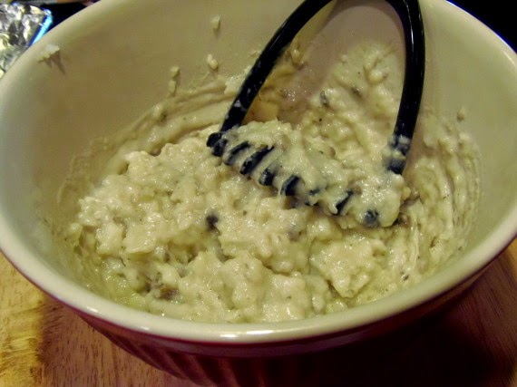 Mashed potato and cream of mushroom soup in a bowl.