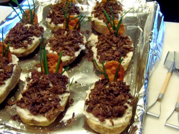 Twice Baked Potato Graves on a foil lined baking sheet.