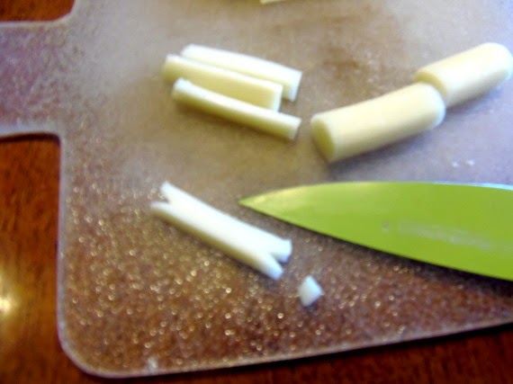 Notched string cheese to make bones.