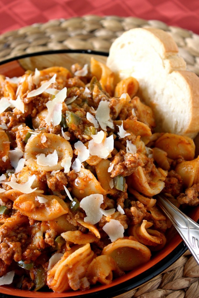 Little ears pasta is mixed with ground pork and lamb meat sauce, green pepper, onion and garlic.