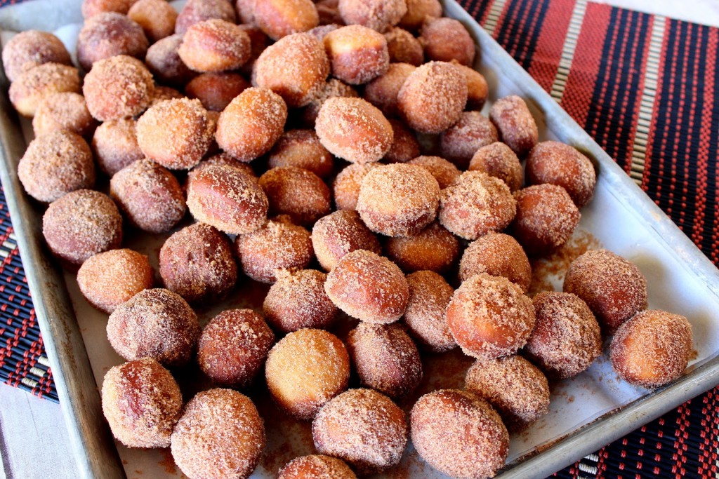 Apple Cider Doughnut Holes are are a seasonal treat that you never outgrow. These soft and pillowy yeasty donuts are dressed to perfection with an irresistible cinnamon sugar topping.