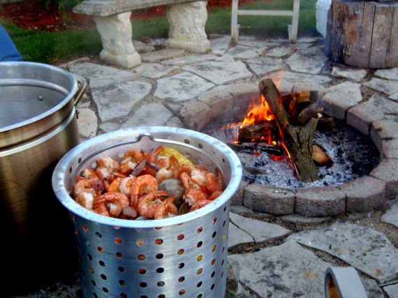 A huge pot of low country boil and a firepit.