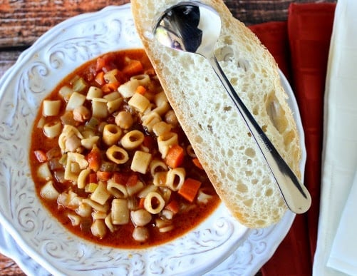 Meatless Tuscan Pasta Soup is quick, rich and hearty. It's a meatless meal but is still loaded with lots of protein from garbanzo beans. - Kudos Kitchen by Renee Meatless Tuscan Pasta Soup is a rich and hearty meatless soup. It's the perfect soup for the cold winter months. | Kudos Kitchen by Renee