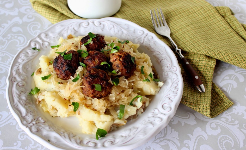 German Meatballs Over Mashed Potatoes and Sauerkraut