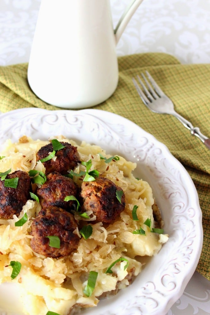 German Meatballs Over Mashed Potatoes and Sauerkraut