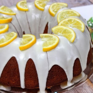 A Meyer Lemon Pound Cake on a glass platter.