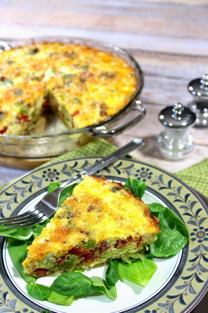 Roasted spaghetti squash is pressed into a pie plate and baked. The "crust" is then filled with veggies, eggs and cheese and baked again. 