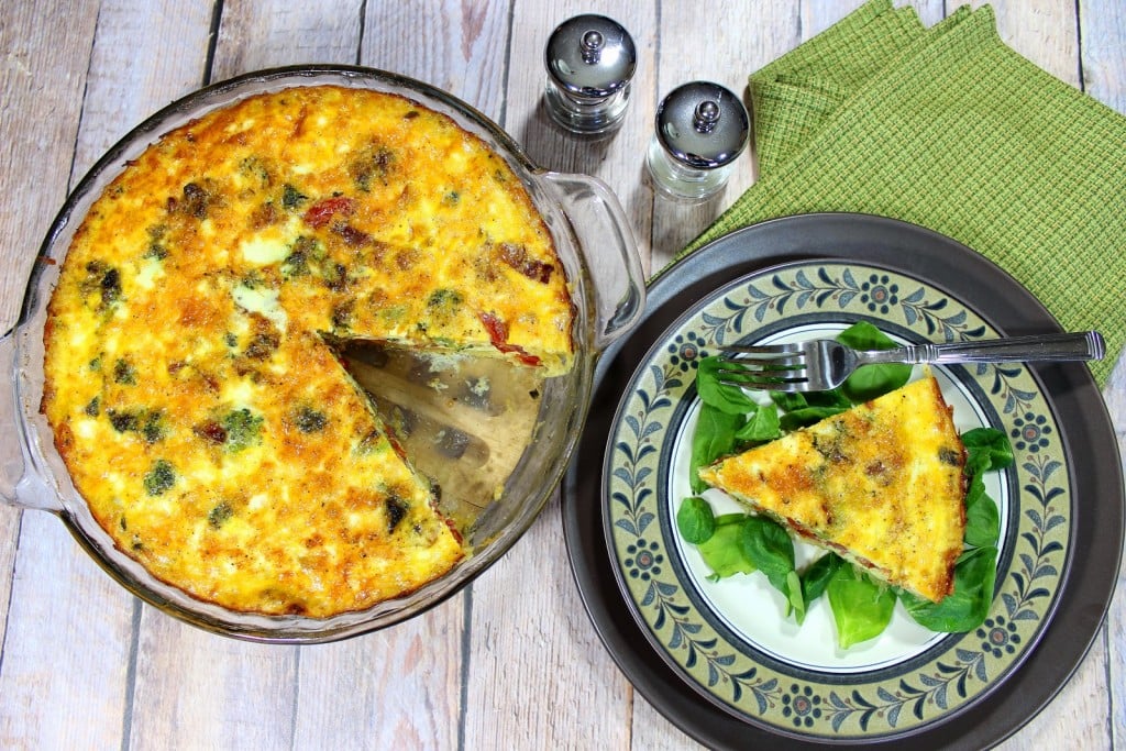 Roasted spaghetti squash is pressed into a pie plate and baked. The "crust" is then filled with veggies, eggs and cheese and baked again. 