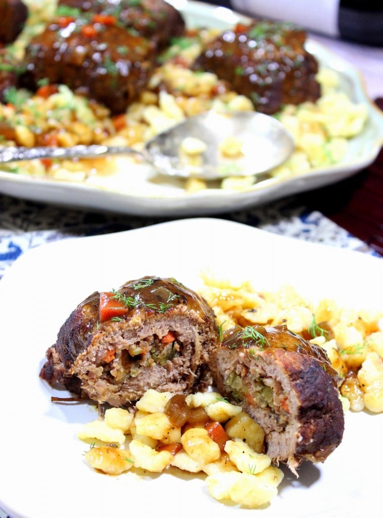 German Beef Rouladen is eye of round steak that is pounded thin, then stuffed and rolled with a mixture of cooked bacon, carrots, celery and dill pickles. German Beef Rouladen - Kudos Kitchen by Renee