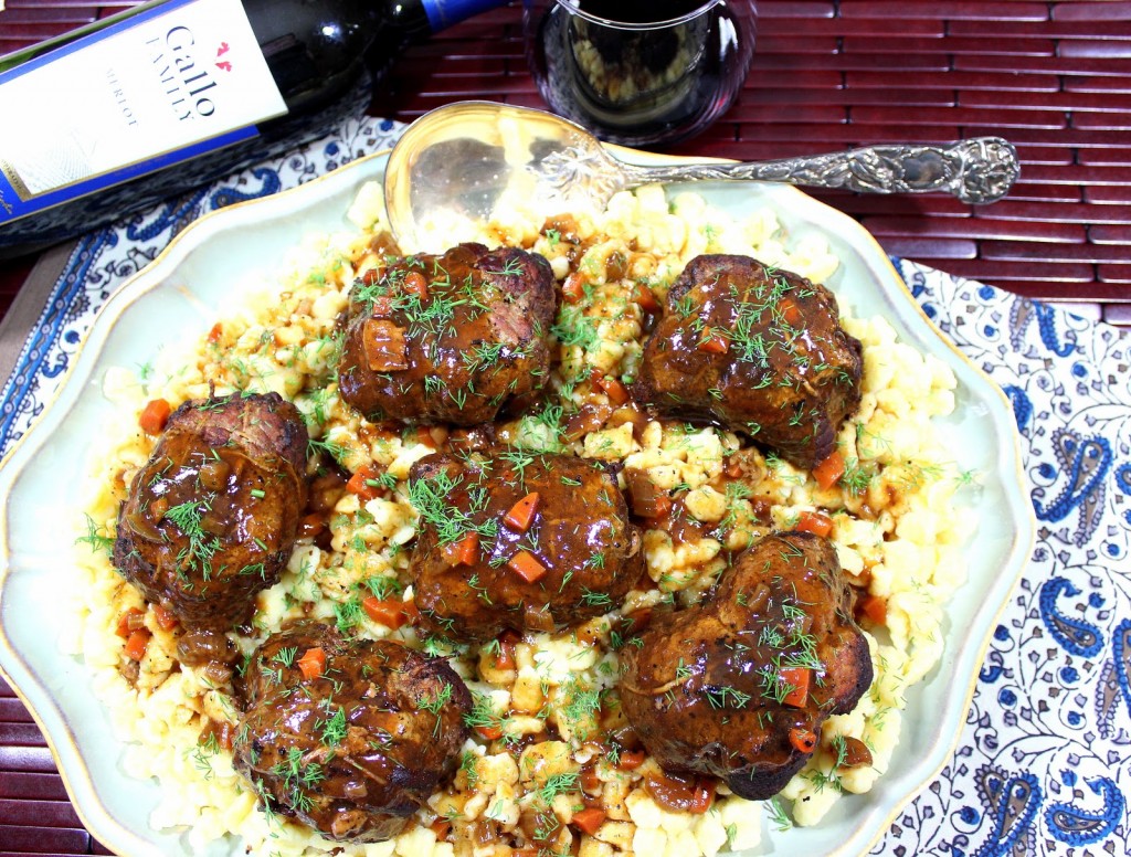 German Beef Rouladen is eye of round steak that is pounded thin, then stuffed and rolled with a mixture of cooked bacon, carrots, celery and dill pickles. German Beef Rouladen - Kudos Kitchen by Renee