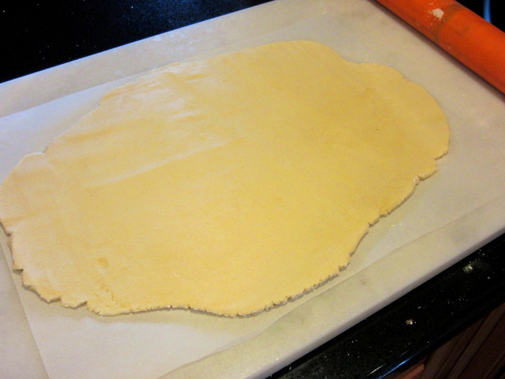 Traditional Irish Shortbread rolled dough on parchment paper - kudoskitchenbyrenee.com