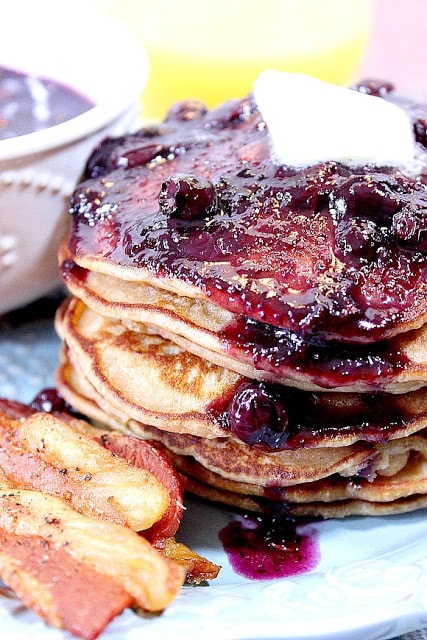 Whole Wheat Peanut Butter Pancakes with Blueberry Maple Syrup is a riff on a PB and J, only in pancake form. - Kudos Kitchen by Renee - www.kudoskitchenbyrenee.com Whole Wheat Peanut Butter Pancakes with Blueberry Maple Syrup