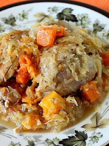 Sauerkraut Chicken on a plate with Butternut Squash.