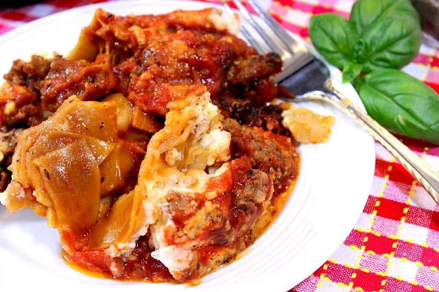 Traditional Italian Lasagna is a labor-intensive dish to make, but this Slow Cooker Meatball Lasagna (shown in the video), and/or a Whole Grain Crock Pot Sausage Lasagna takes only a fraction of the time to make but still has all the robust Italian flavor you love. - kudoskitchenbyrenee.com Slow Cooker Meatball Lasagna and Whole Grain Crock Pot Sausage Lasagna - kudoskitchenbyrenee.com