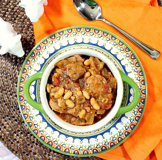 This hearty and delicious Old World Pork with Sausage Cassoulet is comfort food at it's finest. - Kudos Kitchen by Renee Pork and Sausage Cassoulet