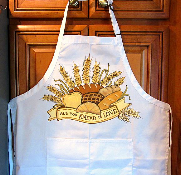 All you knead is love hand painted apron.