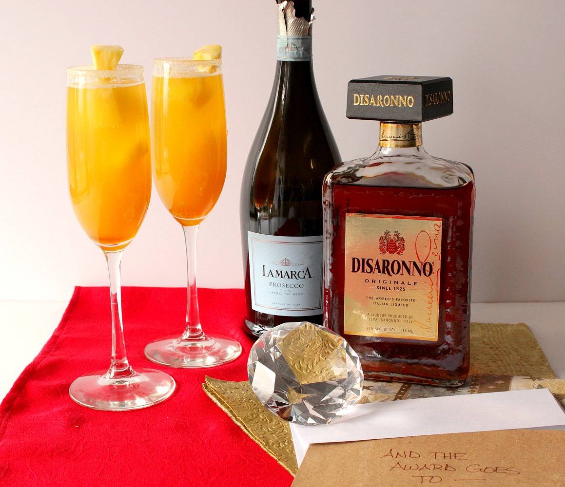 golden statue prosecco cocktail