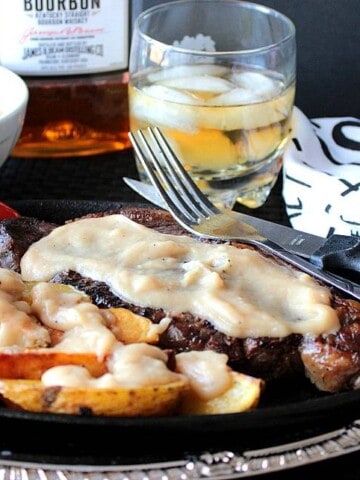 Steak and Roasted Potatoes with Bourbon Butter Sauce is a manly meal that woman will go crazy for too.