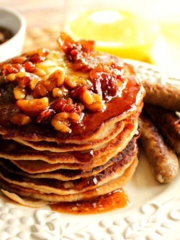 If you're looking to indulge in a wildly delicious stack of pancakes from time to time, do so with these Whole Wheat Banana Bourbon Pancakes with Bourbon Bacon Butter Syrup - Kudos Kitchen by Renee