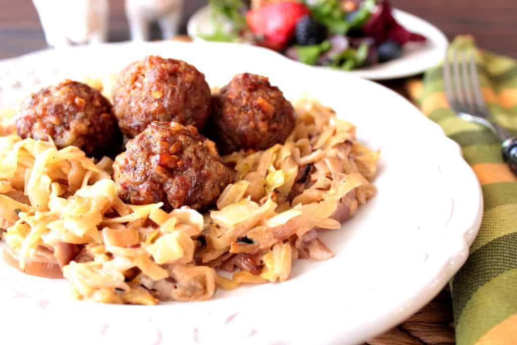 Creamed cabbage with caraway and meatballs