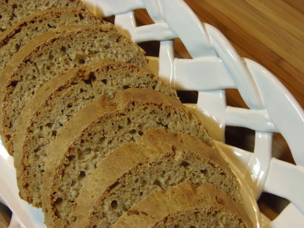 Sourdough Rye Bread with Dill in a shite ceramic basket.