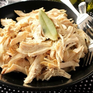 Poached chicken with white wine and bay leaf